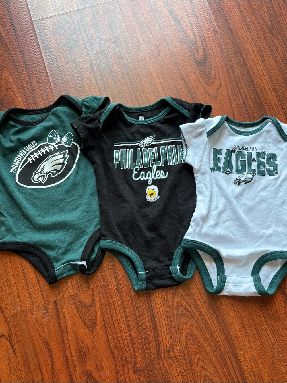 NFL Team Apparel Green, Black and White Baby One Piece Body Suits